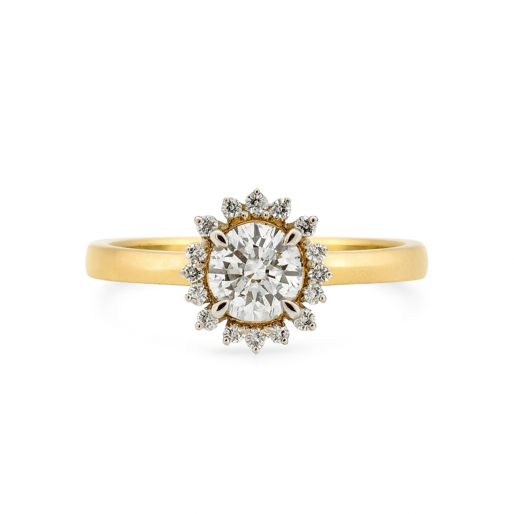 Gold ring with a diamond center on a white background