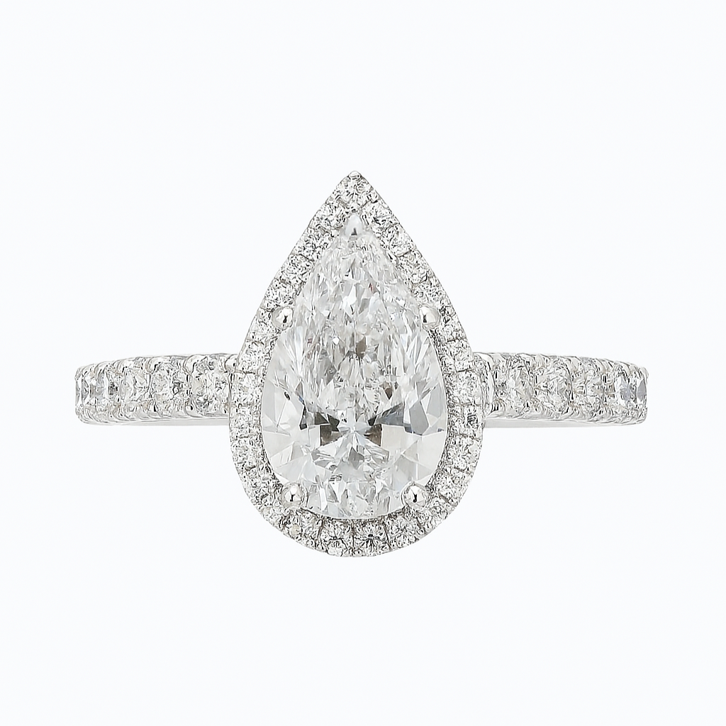 Diamond ring with pear-shaped center stone on a white background