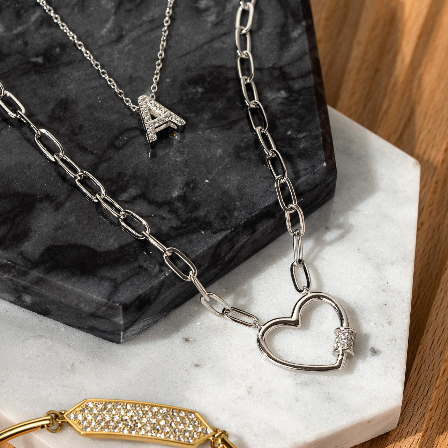 silver necklaces with "a" and heart pendants windsor goldentime jewellers